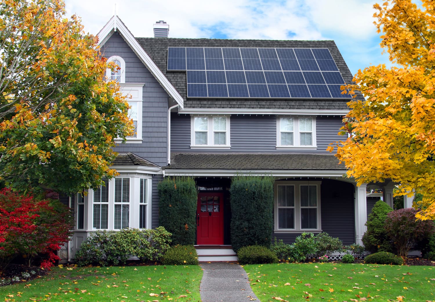 home with solar panels on roof